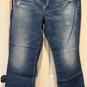 Women's Distressed Blue Jeans